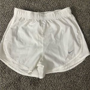 White nike women’s athletic shorts. Size xs. Barley used